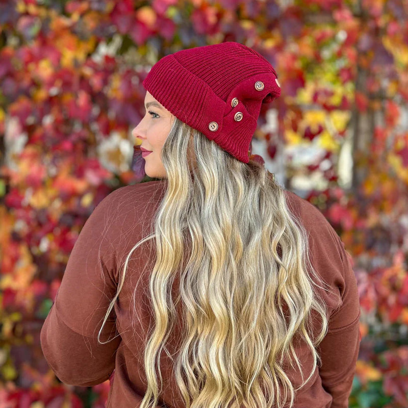 Round button knit hat